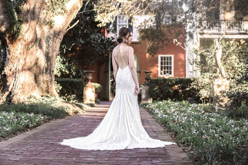 serious and dramatic bride on brick walkway
