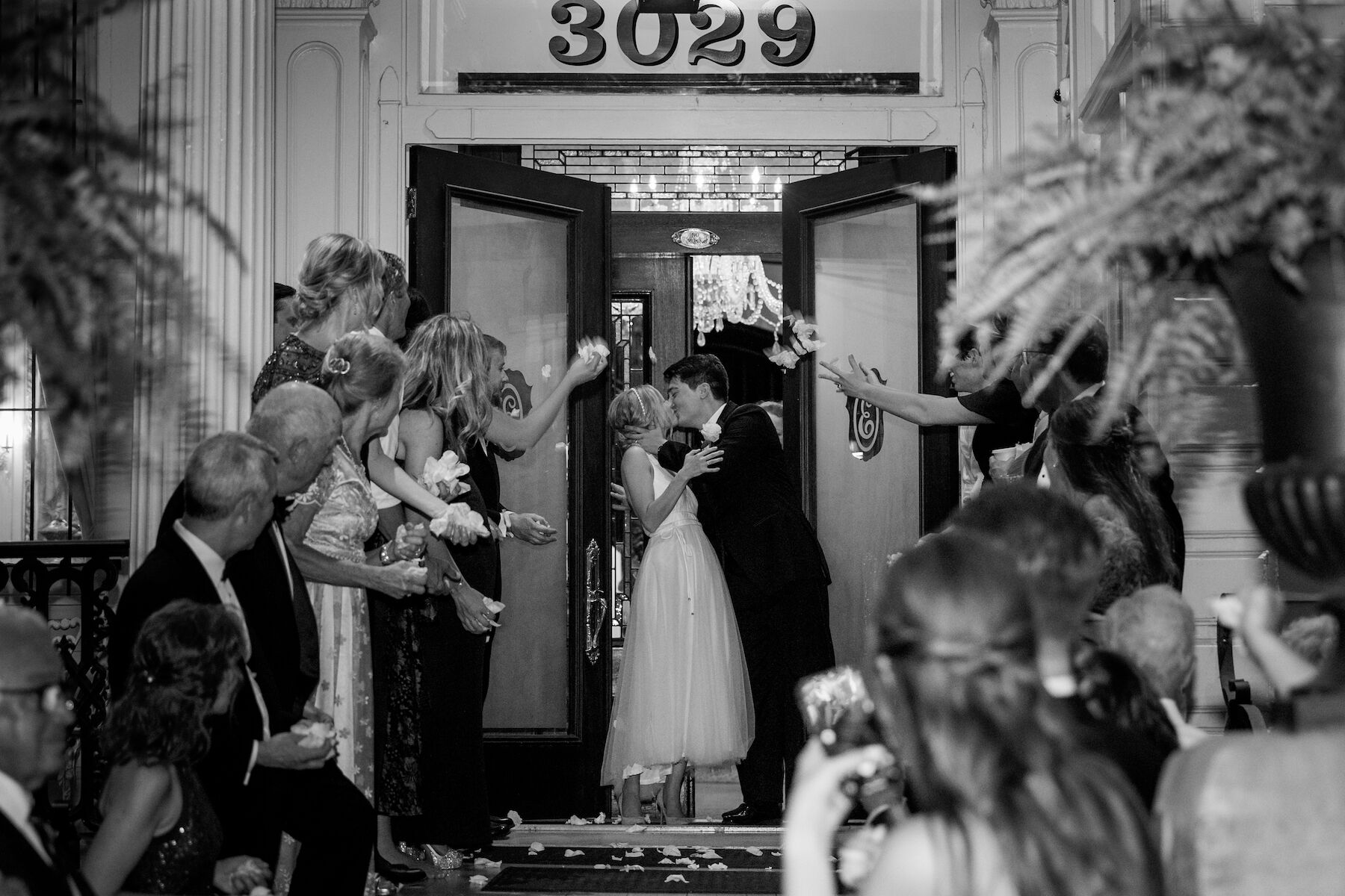 Bride and groom kiss The Elms Mansion