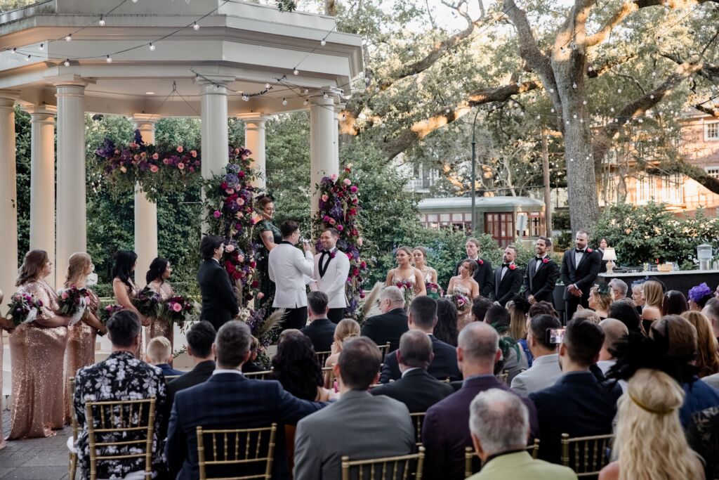 Two grooms exchange vows at the Elms Mansion in New Orleans