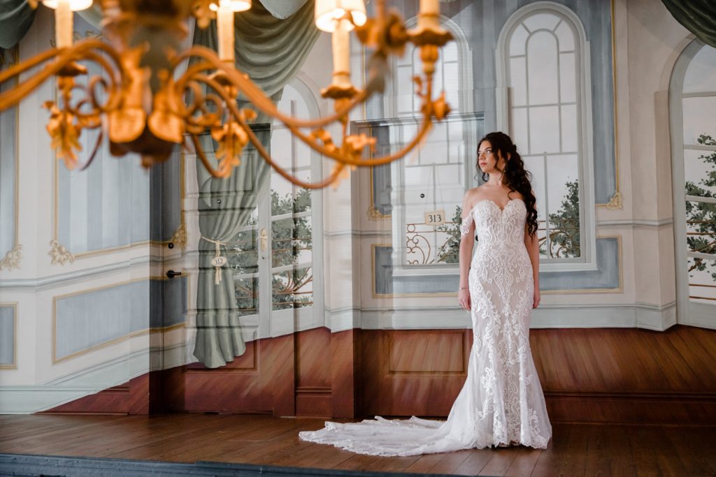 Dramatic bride poses at Hotel Peter & Paul in New Orleans